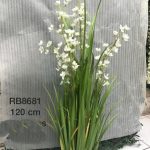 Artificial grass plant with flowers